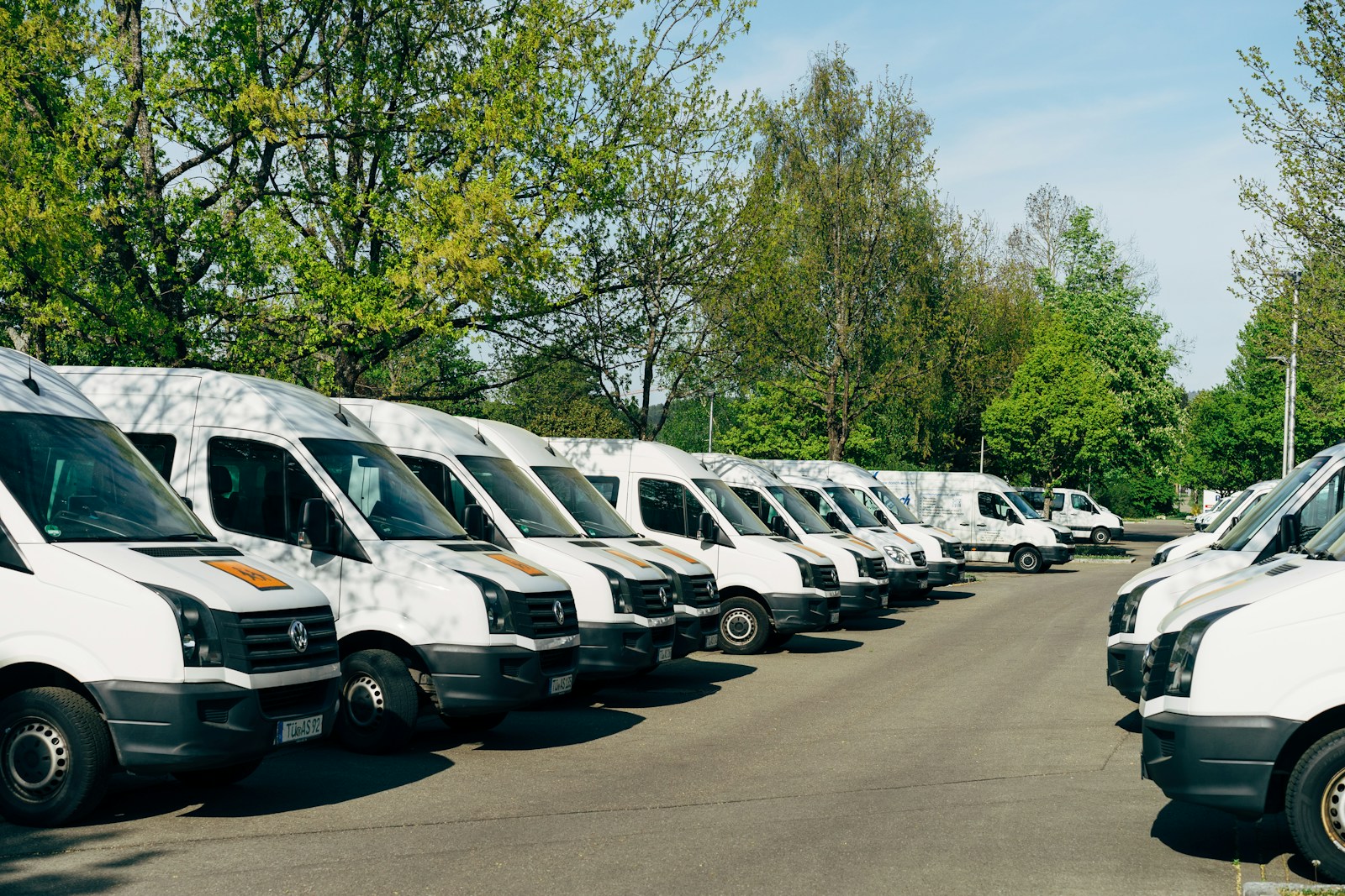 cars parked on parking lot during daytime commercial auto
